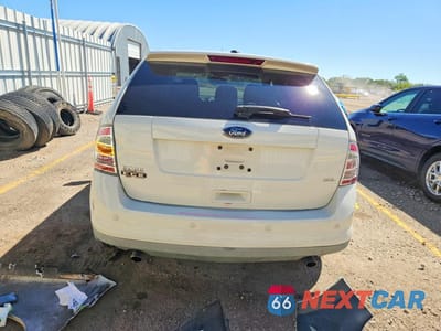 Zdjęcie 6 z 13 samochodu: 2010 FORD EDGE SEL VIN:2FMDK3JC8ABA28162 - miniatura