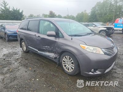 Czwarte zdjęcie samochodu z boku: 2014 TOYOTA SIENNA XLE 8-PASSENGER VIN:5TDYK3DC4ES522766 - miniatura