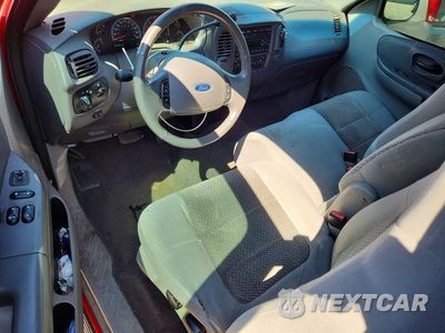 Zdjęcie 8 z 12 samochodu: 2003 FORD F150 VIN:1FTRF07243KC24541 - miniatura