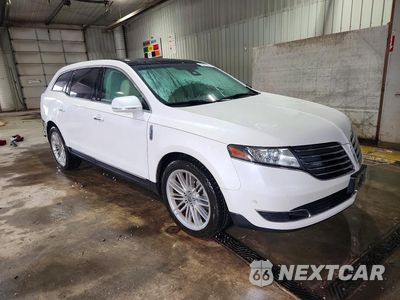 Czwarte zdjęcie samochodu z boku: 2018 LINCOLN MKT VIN:2LMHJ5AT3JBL00038 - miniatura