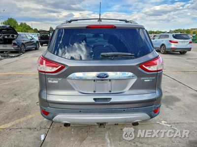 Zdjęcie 6 z 14 samochodu: 2014 FORD ESCAPE TITANIUM VIN:1FMCU9J98EUC76103 - miniatura