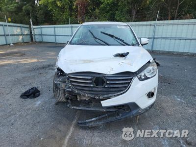 Piąte zdjęcie samochodu w środku: 2016 MAZDA CX-5 TOURING VIN:JM3KE2CY0G0699199 - miniatura
