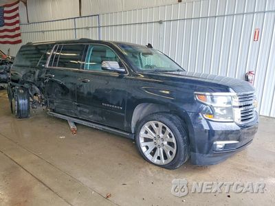 Czwarte zdjęcie samochodu z boku: 2016 CHEVROLET SUBURBAN K1500 LTZ VIN:1GNSKJKC8GR129410 - miniatura