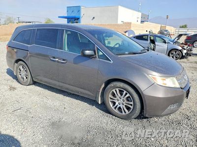 Czwarte zdjęcie samochodu z boku: 2011 HONDA ODYSSEY EXL VIN:5FNRL5H64BB103933 - miniatura