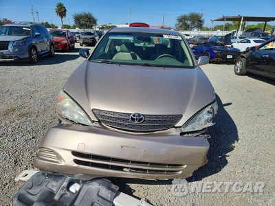Piąte zdjęcie samochodu w środku: 2003 TOYOTA CAMRY LE VIN:JTDBE32K430142849 - miniatura