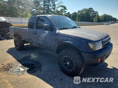 Czwarte zdjęcie samochodu z boku: 2000 TOYOTA TACOMA XTRACAB PRERUNNER VIN:4TASM92N9YZ607057 - miniatura