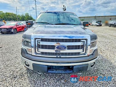 Piąte zdjęcie samochodu w środku: 2014 FORD F150 SUPERCREW VIN:1FTFW1EF5EFA99821 - miniatura