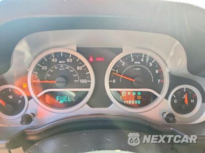 Zdjęcie 9 z 13 samochodu: 2009 JEEP WRANGLER UNLIMITED SAHARA VIN:1J4GA59159L772763 - miniatura