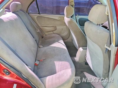 Zdjęcie 10 z 12 samochodu: 2001 TOYOTA COROLLA CE VIN:1NXBR12E51Z423515 - miniatura