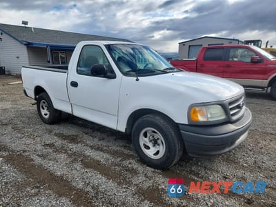 Czwarte zdjęcie samochodu z boku: 2002 FORD F150 VIN:1FTRF172X2KC00555 - miniatura