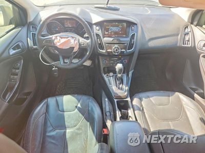 Zdjęcie 8 z 13 samochodu: 2015 FORD FOCUS TITANIUM VIN:1FADP3J25FL259143 - miniatura