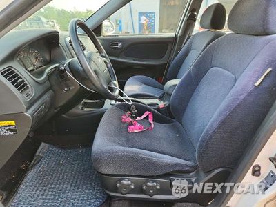 Zdjęcie 7 z 12 samochodu: 2002 HYUNDAI SONATA BASE VIN:KMHWF25S02A680392 - miniatura