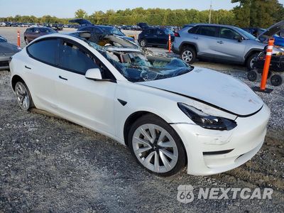 Czwarte zdjęcie samochodu z boku: 2022 TESLA MODEL 3 VIN:5YJ3E1EA2NF129680 - miniatura