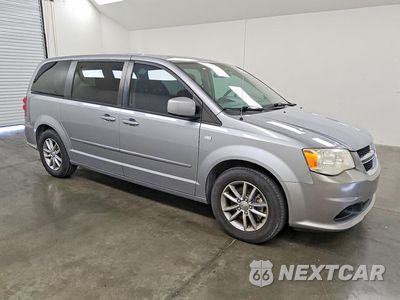 Czwarte zdjęcie samochodu z boku: 2014 DODGE GRAND CARAVAN SE VIN:2C4RDGBGXER194421 - miniatura