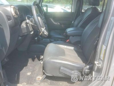 Zdjęcie 7 z 13 samochodu: 2016 JEEP WRANGLER UNLIMITED SAHARA VIN:1C4BJWEG9GL291749 - miniatura