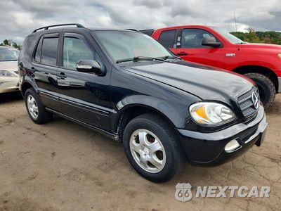 Czwarte zdjęcie samochodu z boku: 2004 MERCEDES-BENZ ML 350 VIN:4JGAB57E74A464962 - miniatura