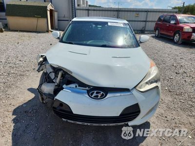 Piąte zdjęcie samochodu w środku: 2014 HYUNDAI VELOSTER BASE VIN:KMHTC6AD9EU188800 - miniatura