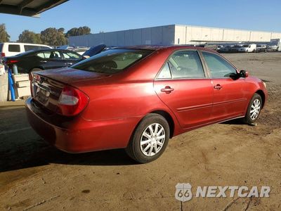 Trzecie zdjęcie samochodu z tyłu: 2002 TOYOTA CAMRY LE VIN:JTDBE32K020092420 - miniatura