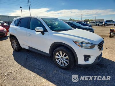 Czwarte zdjęcie samochodu z boku: 2016 MAZDA CX-5 TOURING VIN:JM3KE2CY4G0849704 - miniatura