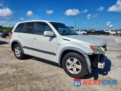 Czwarte zdjęcie samochodu z boku: 2012 SUZUKI GRAND VITARA PREMIUM VIN:JS3TE0D62C4100225 - miniatura