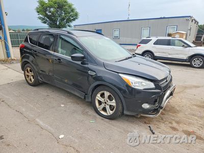 Czwarte zdjęcie samochodu z boku: 2014 FORD ESCAPE SE VIN:1FMCU9G91EUA31702 - miniatura