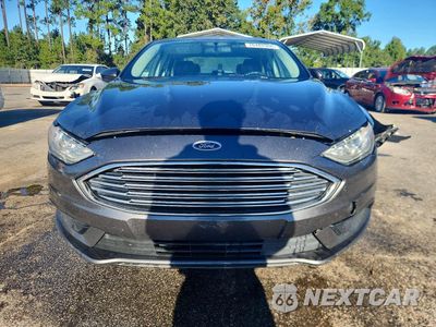 Piąte zdjęcie samochodu w środku: 2017 FORD FUSION SE HYBRID VIN:3FA6P0LUXHR374086 - miniatura
