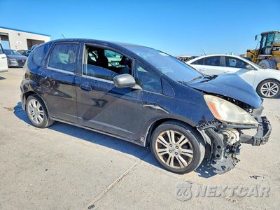 Czwarte zdjęcie samochodu z boku: 2010 HONDA FIT SPORT VIN:JHMGE8H4XAC028201 - miniatura
