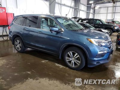 Czwarte zdjęcie samochodu z boku: 2017 HONDA PILOT EXL VIN:5FNYF6H66HB052372 - miniatura