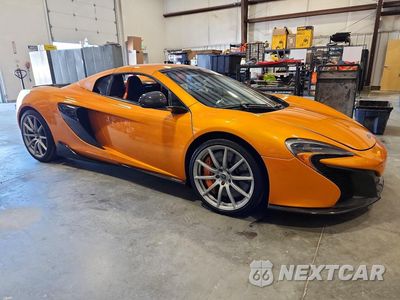 Czwarte zdjęcie samochodu z boku: 2015 MCLAREN AUTOMOTIVE 650S SPIDER VIN:SBM11FAA6FW004062 - miniatura