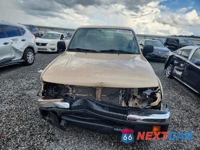 Piąte zdjęcie samochodu w środku: 2000 TOYOTA TACOMA V6 VIN:4TAWN72N1YZ581072 - miniatura