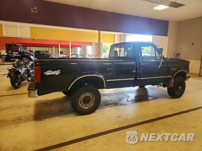 Trzecie zdjęcie samochodu z tyłu: 1997 FORD F350 VIN:1FTHF36H1VEA96389 - miniatura