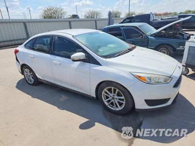 Czwarte zdjęcie samochodu z boku: 2017 FORD FOCUS SE VIN:1FADP3F20HL295382 - miniatura