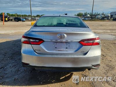 Zdjęcie 6 z 13 samochodu: 2021 TOYOTA CAMRY LE VIN:4T1C11AK0MU561647 - miniatura