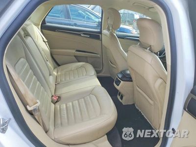 Zdjęcie 10 z 12 samochodu: 2014 FORD FUSION SE PHEV VIN:3FA6P0PU1ER397679 - miniatura