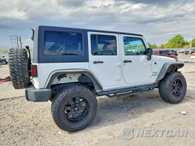 Trzecie zdjęcie samochodu z tyłu: 2012 JEEP WRANGLER UNLIMITED SPORT VIN:1C4BJWDG4CL282887 - miniatura