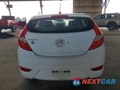 Zdjęcie 6 z 13 samochodu: 2014 HYUNDAI ACCENT GS VIN:KMHCT5AEXEU161642 - miniatura