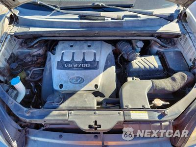 Zdjęcie 12 z 13 samochodu: 2005 HYUNDAI TUCSON GLS VIN:KM8JN72D45U124623 - miniatura