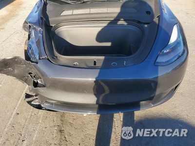 Zdjęcie 11 z 12 samochodu: 2023 TESLA MODEL Y VIN:7SAYGDEF4PF857195 - miniatura