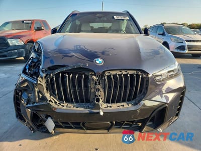Piąte zdjęcie samochodu w środku: 2025 BMW X5 XDRIVE40I VIN:5UX23EU08S9Z13075 - miniatura