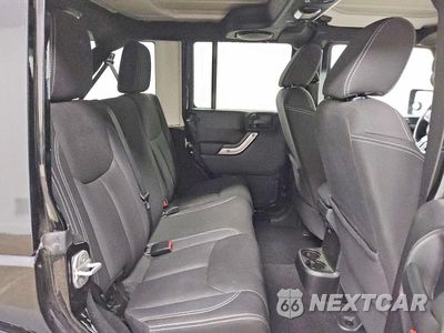 Zdjęcie 11 z 13 samochodu: 2013 JEEP WRANGLER UNLIMITED SAHARA VIN:1C4BJWEG7DL655792 - miniatura