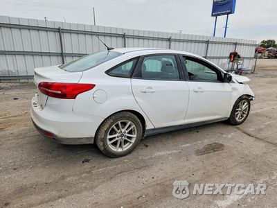 Trzecie zdjęcie samochodu z tyłu: 2016 FORD FOCUS SE VIN:1FADP3F26GL398336 - miniatura