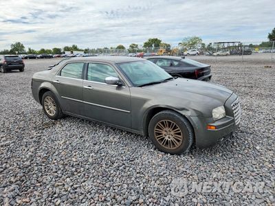 Czwarte zdjęcie samochodu z boku: 2010 CHRYSLER 300 TOURING VIN:2C3CA5CV3AH140009 - miniatura