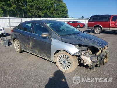 Czwarte zdjęcie samochodu z boku: 2012 FORD FOCUS TITANIUM VIN:1FAHP3J21CL365473 - miniatura