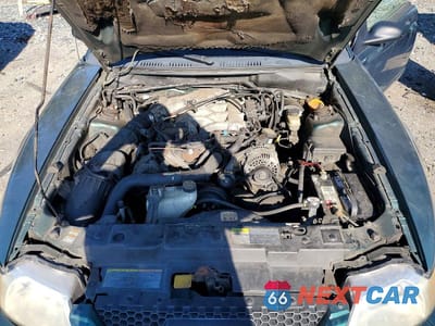 Zdjęcie 11 z 12 samochodu: 2000 FORD MUSTANG VIN:1FAFP4449YF308860 - miniatura