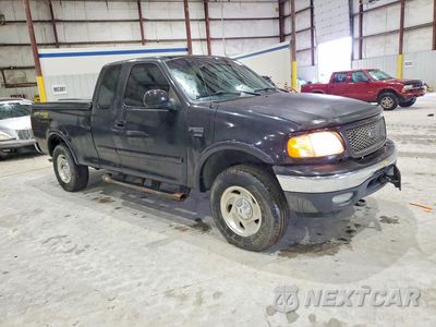 Czwarte zdjęcie samochodu z boku: 2001 FORD F150 VIN:1FTRX18L21KF20911 - miniatura