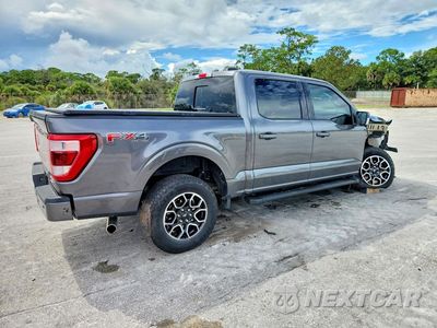 Trzecie zdjęcie samochodu z tyłu: 2023 FORD F150 SUPERCREW VIN:1FTFW1E85PKF93883 - miniatura