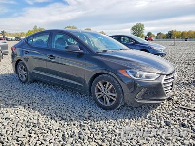 Czwarte zdjęcie samochodu z boku: 2017 HYUNDAI ELANTRA VALUE EDITION VIN:5NPD84LF6HH211011 - miniatura