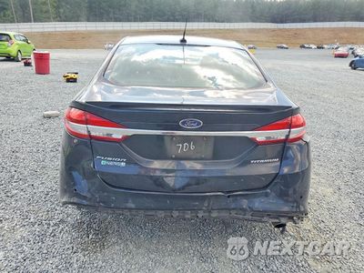 Zdjęcie 6 z 12 samochodu: 2017 FORD FUSION TITANIUM PHEV VIN:3FA6P0SUXHR209706 - miniatura