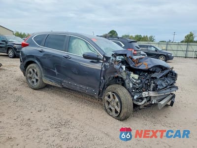 Czwarte zdjęcie samochodu z boku: 2018 HONDA CR-V EXL VIN:7FARW2H84JE036664 - miniatura
