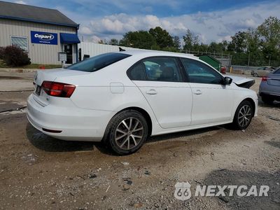 Trzecie zdjęcie samochodu z tyłu: 2016 VOLKSWAGEN JETTA SE VIN:3VWD67AJ4GM358321 - miniatura